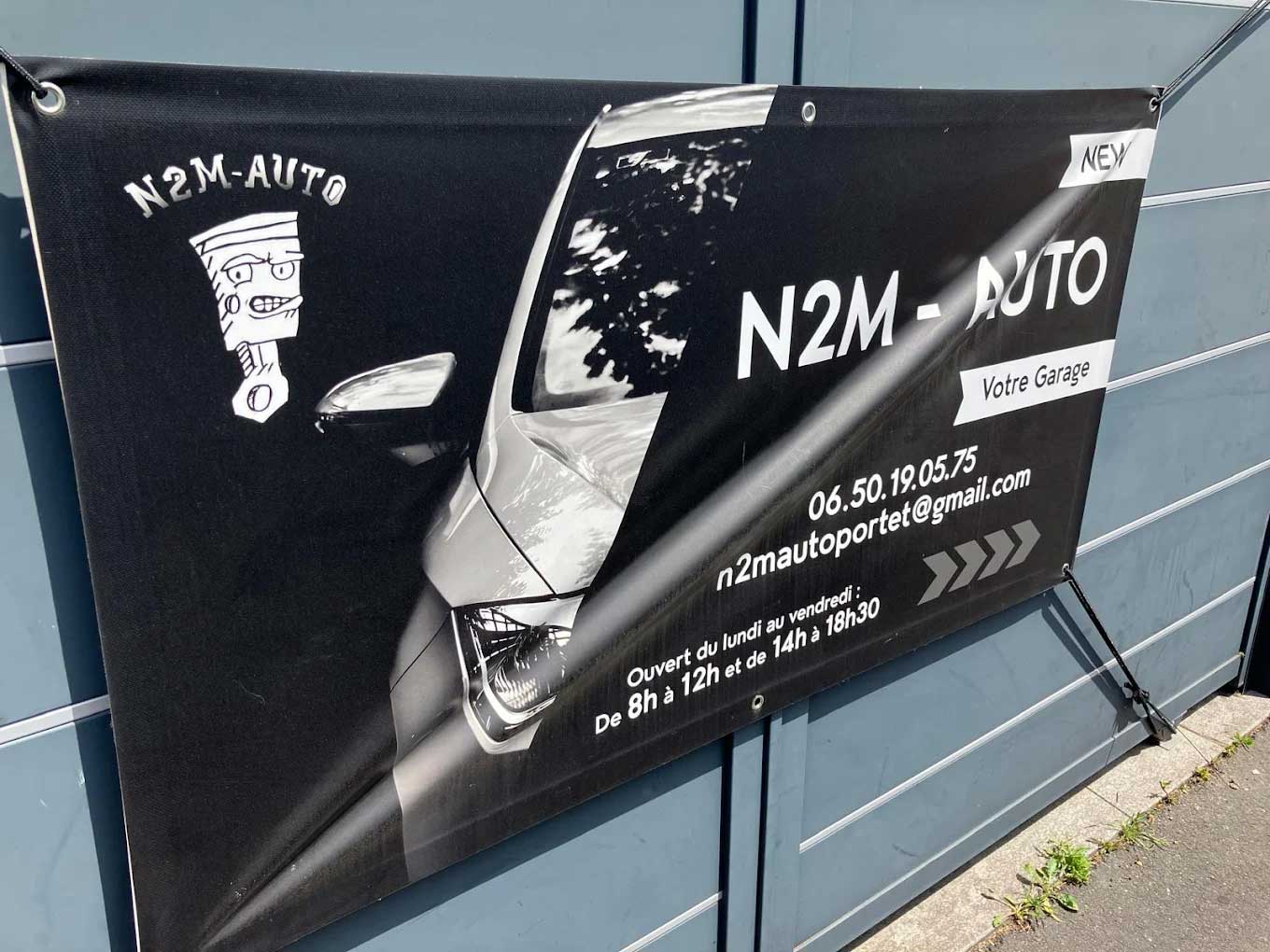 Bâche du garage automobile N2M-AUTO à Herblay-sur-Seine